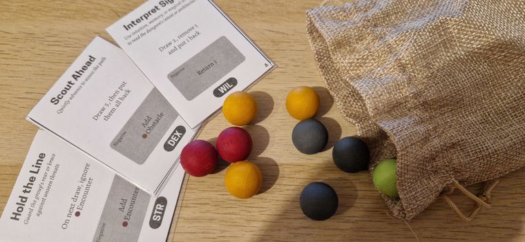 Picture displaying a bag with small balls of different colors